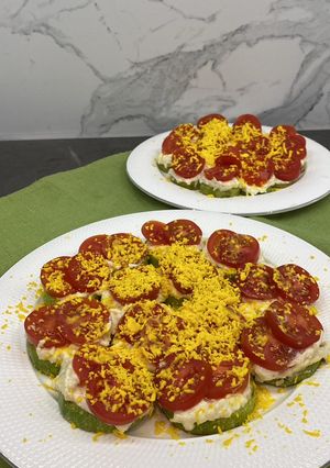 Кабачки під сирною шубою та томатами