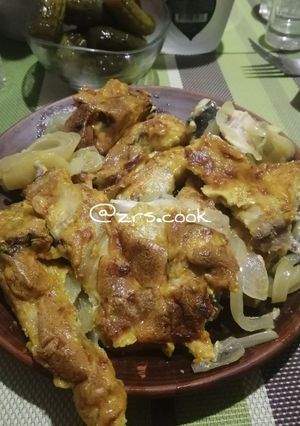 Запечена риба на цибуляній подушці