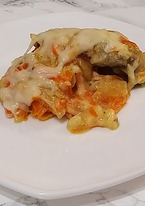 Минтай, тушеный в молоке