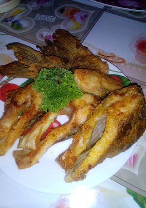 Риба в сметанно-цибулевому соусі