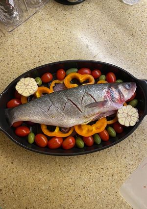 Сибас, запечённый в духовке с овощами