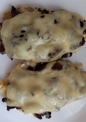 Тілапія з печерицями