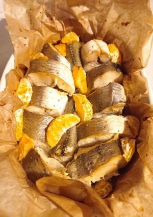 Хек запечённый с мандаринами