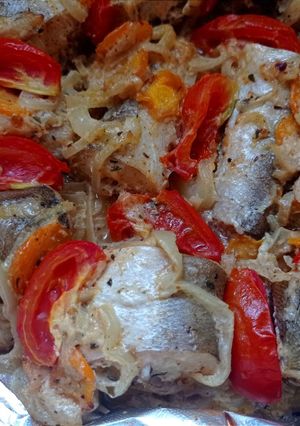 Хек запечённый с овощами