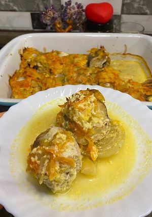 Хек з овочами в духовці