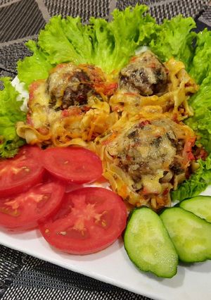 Гнізда з фаршем та овочами в духовці