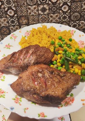 Качине філе смажене з овочами та рисом