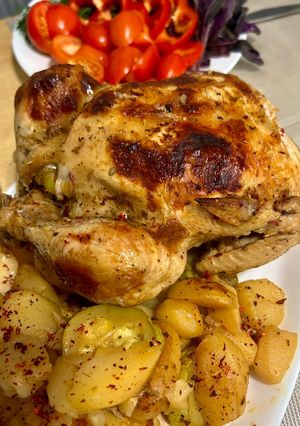Курка запечена у рукаві з картоплею та кабачком
