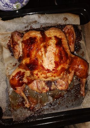 Курочка з вершковим маслом під соусом в духовці