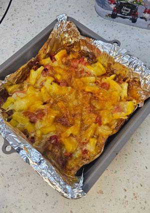 Курятина запечена з ананасами і сиром