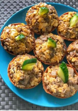 Тарталетки з грибами та сиром